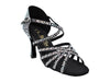 Glamorous black dance shoes featuring shimmering glitter and satin finish