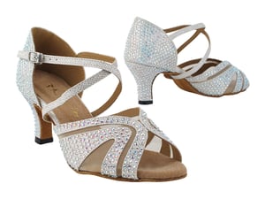 White glitter satin and mesh ballroom heels sparkling under light