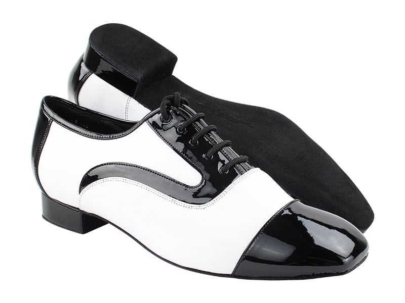 Black patent and white leather dance shoes