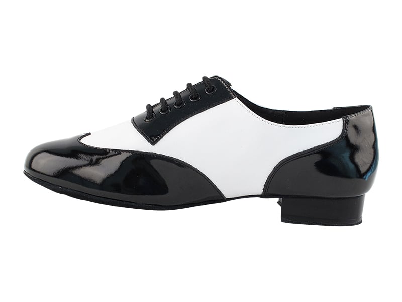 Black patent and white leather dance shoes