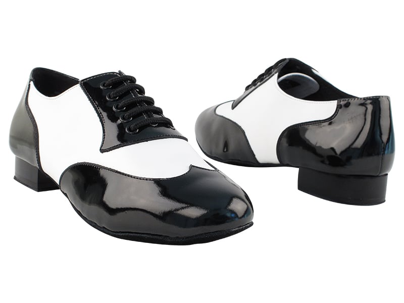 Black patent and white leather dance shoes