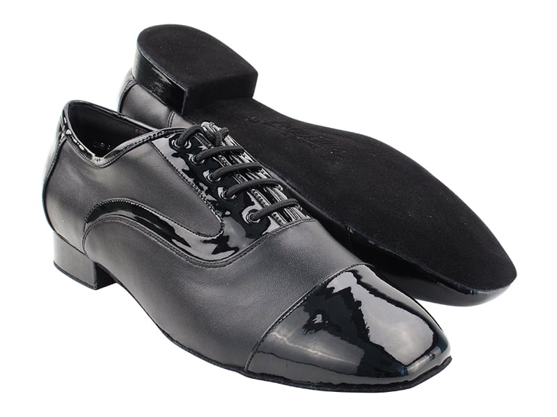 Black patent and black leather dance shoes